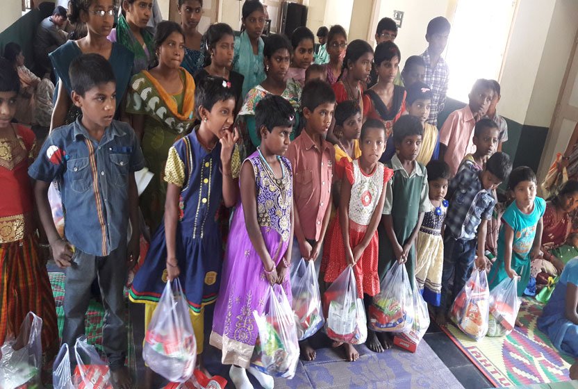 DISTRIBUTION OF CLOTHES TO POOR PEOPLE Image